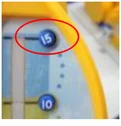 Misaligned button. The ellipse identifies the button’s incorrect installed position.