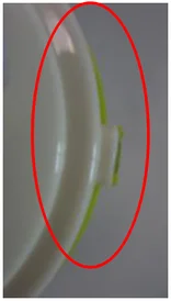 Surface step mismatch. The ellipse follows the uneven level between assembled surfaces.