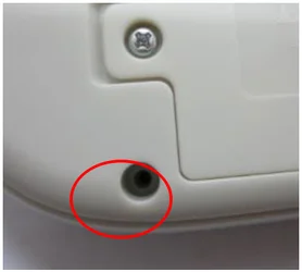Missing screw. The ellipse marks an empty screw location.