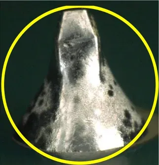 Acceptable solder-joint training close-up with the original yellow inspection circle