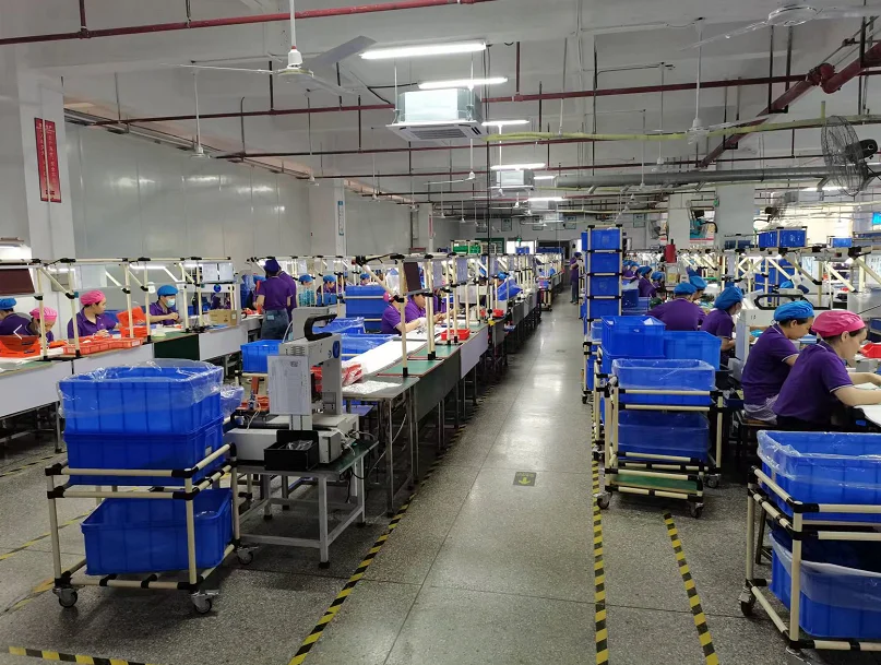 Organized assembly lines and material flow in the Xinyinhai production workshop