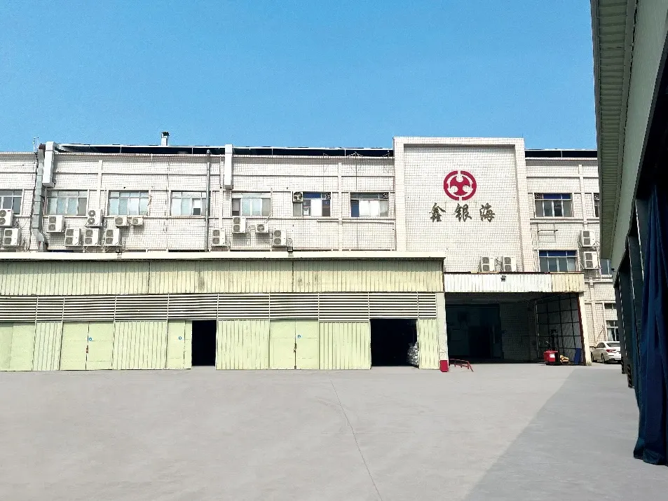 Xinyinhai’s factory building and own company sign in Humen, Dongguan