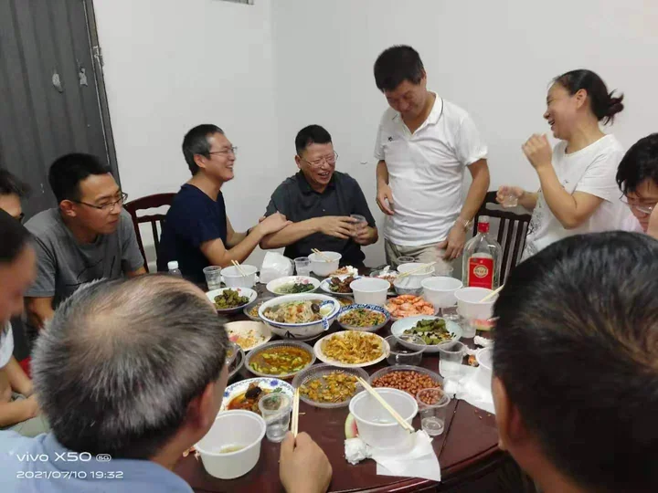 Employee gathering and shared meal — photograph 7