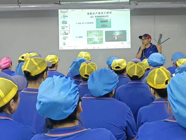 Production team learning session — photograph 3