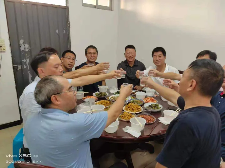 Employee gathering and shared meal — photograph 8