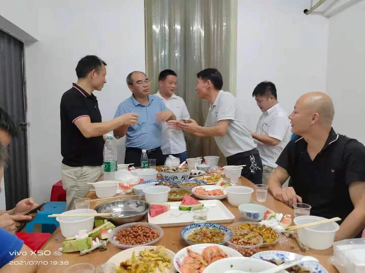 Employee gathering and shared meal — photograph 9