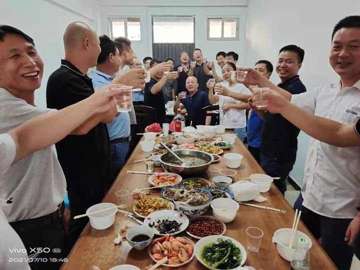 Employee gathering and shared meal — photograph 6